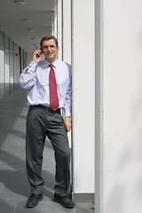 Image showing Businessman talking on cell phone