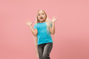 Image showing Portrait of the scared girl on pink