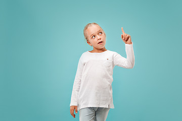 Image showing Young serious thoughtful teen girl. Doubt concept.