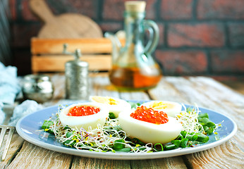 Image showing eggs with red salmon caviar