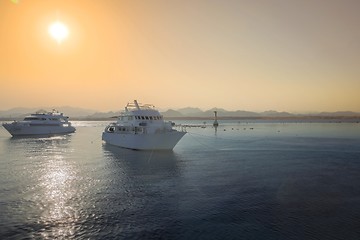 Image showing Luxury yacht docking near coral reef