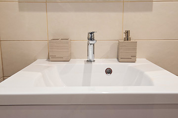 Image showing Bathroom interior with sink and faucet