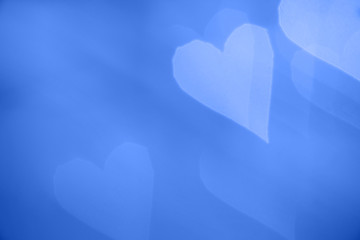 Image showing Defocused bokeh light hearts. Blue toned.