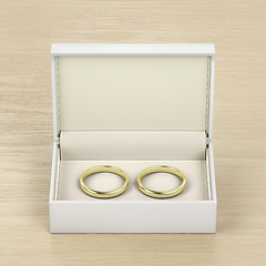Image showing Box with gold wedding rings