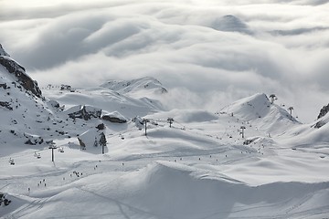 Image showing Snowy skiing slopes from the top