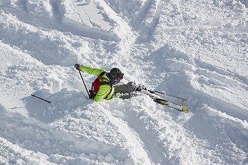 Image showing Skier falls in deep snow