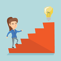 Image showing Business woman walking upstairs to the idea bulb.