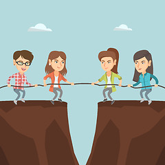 Image showing Two groups of business people pulling rope.