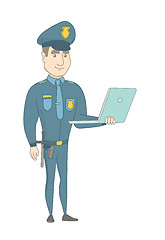 Image showing Young caucasian policeman using a laptop.