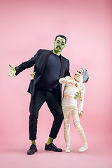 Image showing Halloween Family. Happy Father and Children Girl in Halloween Costume and Makeup