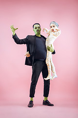 Image showing Halloween Family. Happy Father and Children Girl in Halloween Costume and Makeup