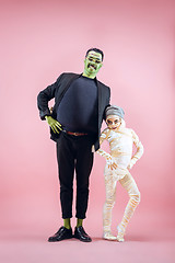 Image showing Halloween Family. Happy Father and Children Girl in Halloween Costume and Makeup