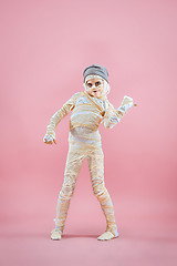 Image showing Studio image of a young teen girl man bandaged,