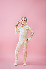 Image showing Studio image of a young teen girl man bandaged,