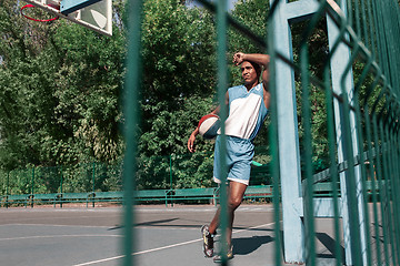 Image showing Picture of young resting african basketball player