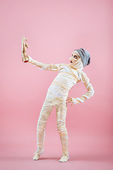 Image showing Studio image of a young teen girl man bandaged,