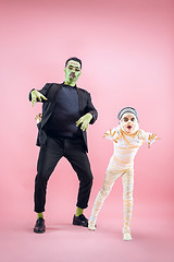 Image showing Halloween Family. Happy Father and Children Girl in Halloween Costume and Makeup