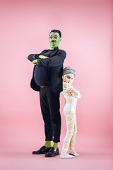 Image showing Halloween Family. Happy Father and Children Girl in Halloween Costume and Makeup