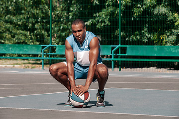 Image showing Picture of young resting african basketball player