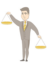 Image showing Caucasian businessman holding balance scale.