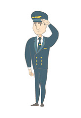 Image showing Young caucasian pilot saluting.