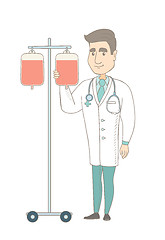 Image showing Young caucasian doctor preparing drop counter.