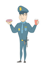 Image showing Policeman eating doughnut and drinking coffee.