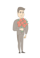 Image showing Caucasian businessman holding bouquet of flowers.