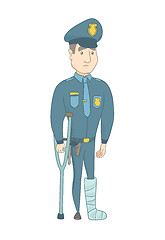 Image showing Injured young caucasian policeman with broken leg.