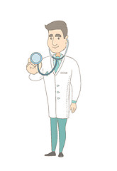 Image showing Young caucasian doctor holding a stethoscope.