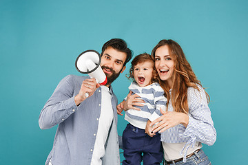 Image showing happy father and son playing together with soccer ball on white