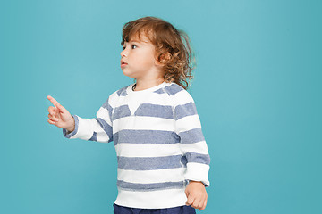 Image showing Portrait of happy joyful beautiful little boy, studio shot