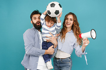 Image showing happy father and son playing together with soccer ball on white