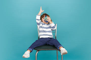 Image showing Portrait of happy joyful beautiful little boy, studio shot