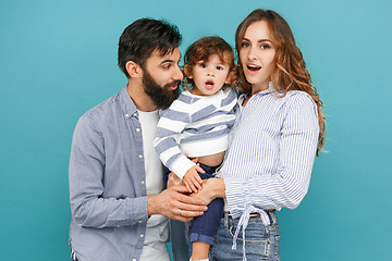 Image showing A happy family on blue background