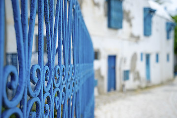 Image showing Aged Blue doors and windows in Andalusian style from Sidi Bou Sa