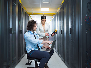 Image showing technicians working together on servers