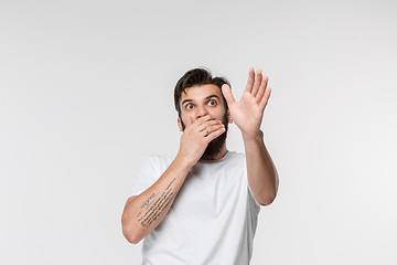 Image showing Portrait of the scared man on white