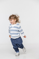 Image showing Portrait of happy joyful beautiful little boy, studio shot