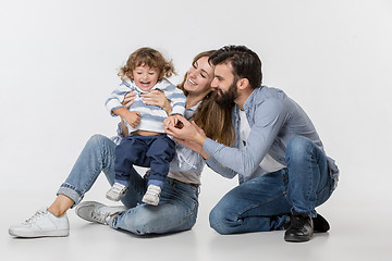 Image showing A happy family on white background