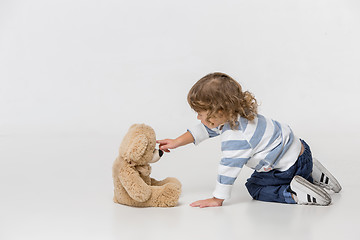 Image showing Portrait of happy joyful beautiful little boy, studio shot