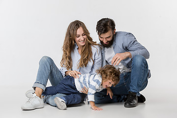 Image showing A happy family on white background