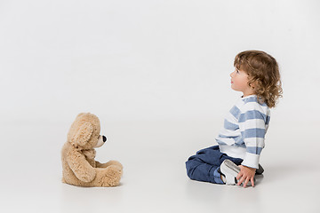 Image showing Portrait of happy joyful beautiful little boy, studio shot