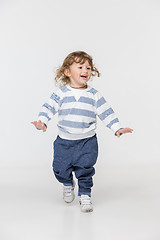 Image showing Portrait of happy joyful beautiful little boy, studio shot