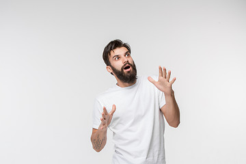 Image showing Portrait of the scared man on white