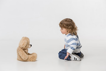 Image showing Portrait of happy joyful beautiful little boy, studio shot