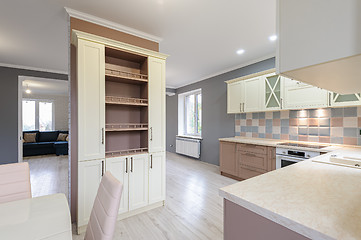 Image showing Luxury modern provence styled grey, pink and cream kitchen interior