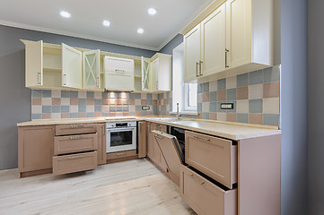 Image showing Luxury modern provence styled grey, pink and cream kitchen interior