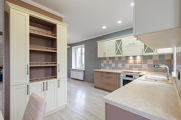 Image showing Luxury modern provence styled grey, pink and cream kitchen interior