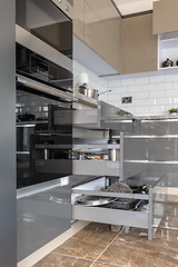 Image showing Luxury modern white, beige and grey kitchen interior